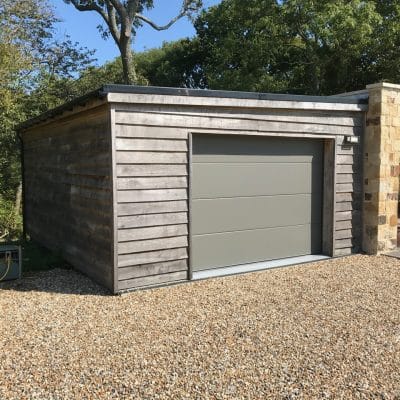 Green oak weatherboarded garage design build Kent Sussex