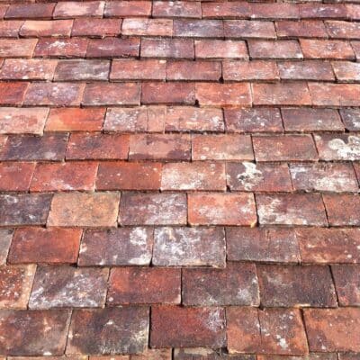 Handmade Keymer tiles on roof of barn conversion design build Kent Sussex